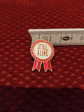 'Still alive' enamel pin - Mycomicshop.be